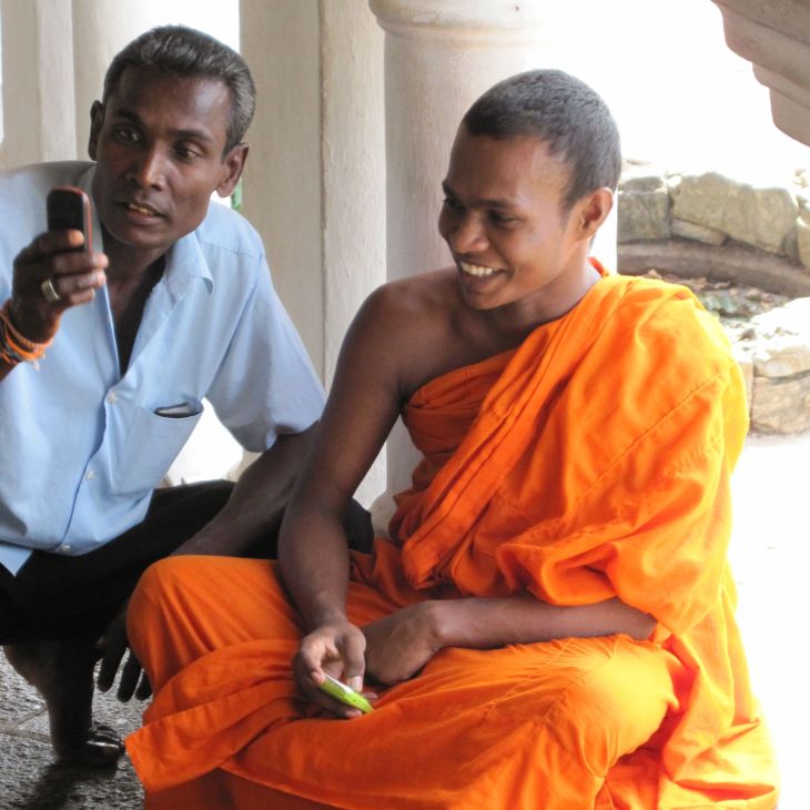 Monk with Phone