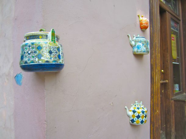 Teapots on wall