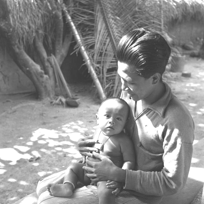 Balinese father and baby