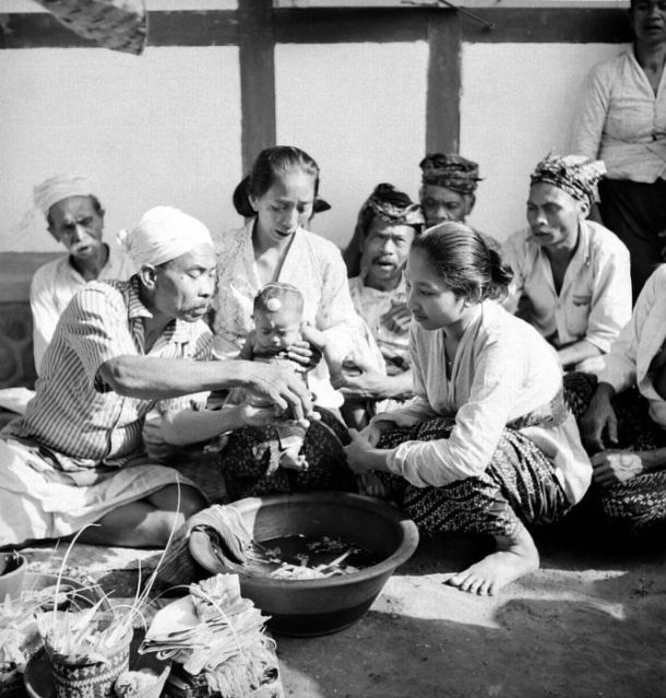 Ceremonial bathing of Balinese baby