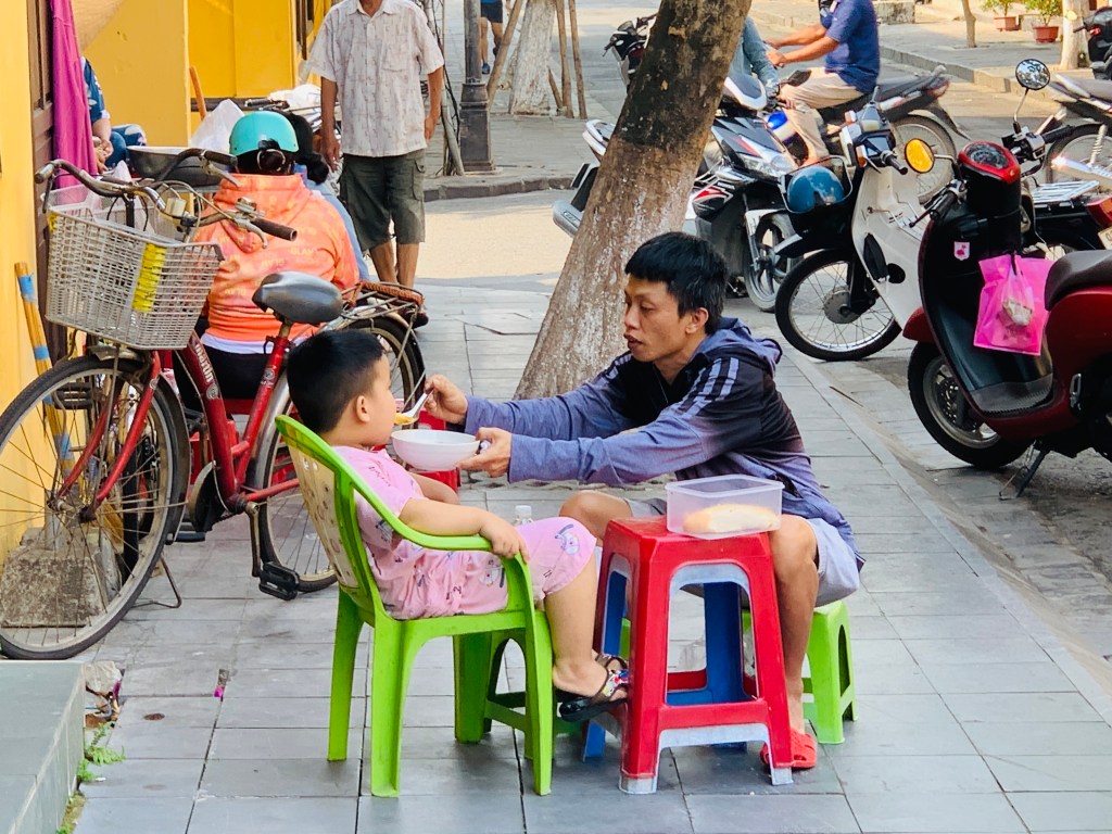 Dad and son, Hoi An, Vietnam.